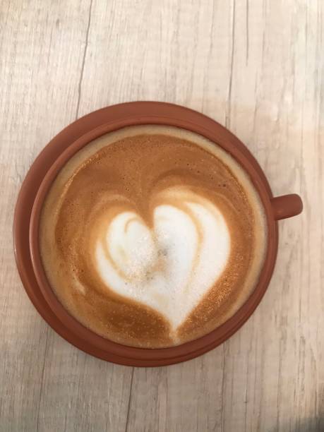istock cup of hot cappuccino in a bar 1548414112