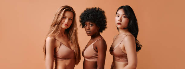 istock Multiethnic women on beige background 1548437309