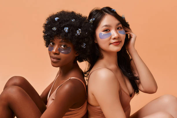 istock Multiethnic women on beige background 1548441620