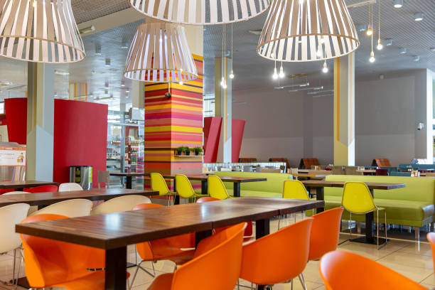 istock Modern restaurant interior with bright red and green design 1548463032