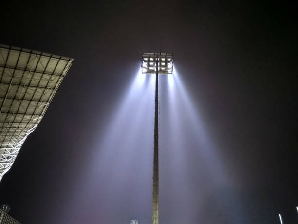 istock football stadium lights from behind 1548501256