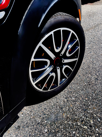Close-up of Front running flat tire on car background