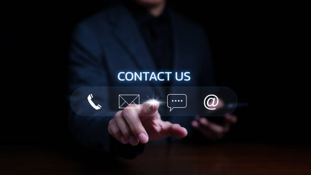 istock Contact us or the Customer support hotline people connect. Businessman using mobile phone and using hand touching virtual icons call phone, email, address, and live chat. Customer service call center. 1548737563