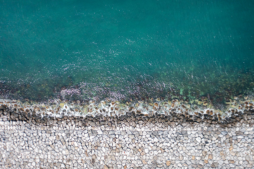 Aerial view of Black Sea Waves and Protection Concrete Barriers in the Sea.