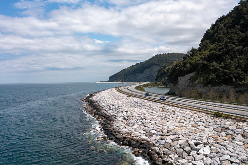 Aerial view of Black sea coastal highway on a clear day.