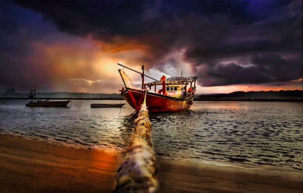 istock Boats in seaside with Dramatic Sunset cloud background in Dammam Corniche -Saudi Arabia. 1548791332