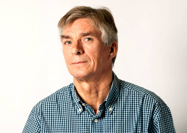 istock Pensive man with grey hair wearing shirt 154882453