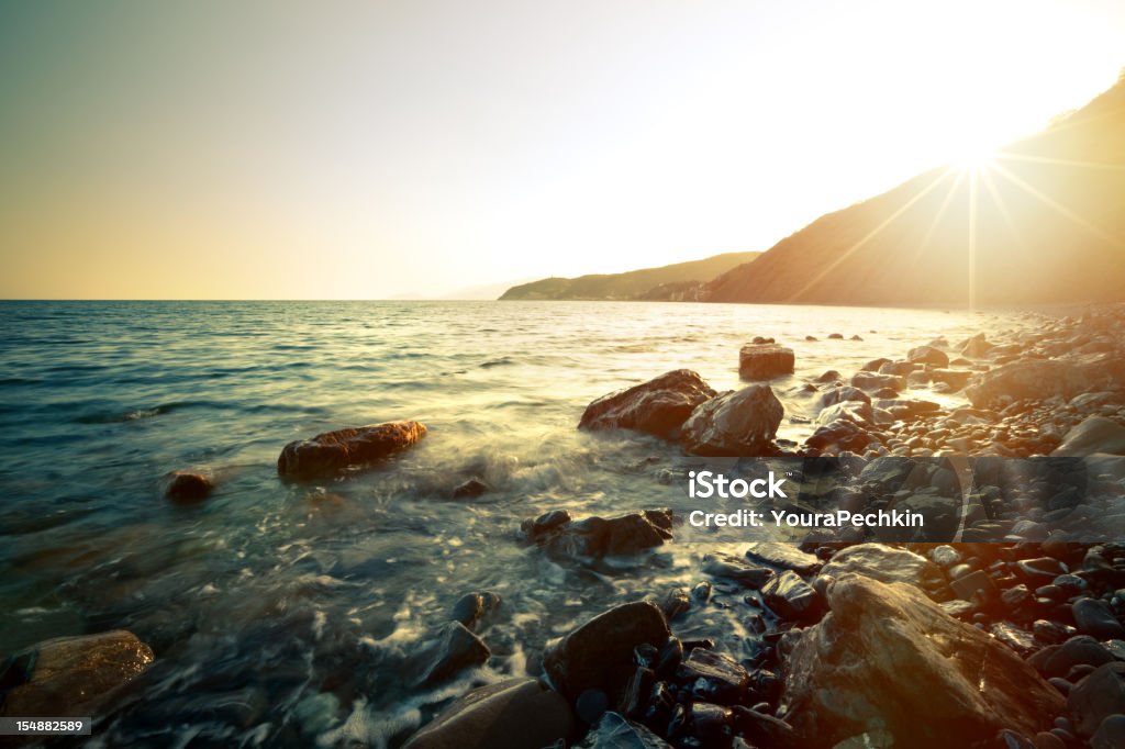 Morze Zachód słońca - Zbiór zdjęć royalty-free (Fotografika)