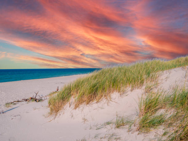istock sunset over the north sea with dunes 1548835215