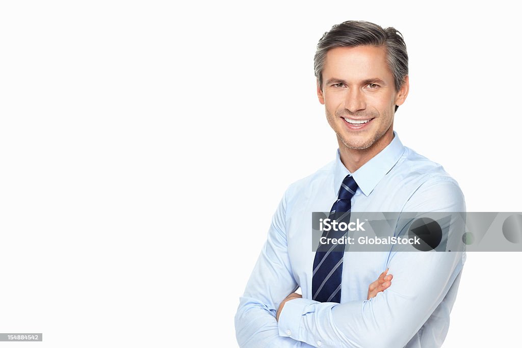 Business man with hands folded smiling - copyspace Senior executive smiling with hands folded against white Businessman Stock Photo