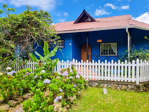 Panama, Boquete, May 31, 2022, outdoor view of a blue wooden house