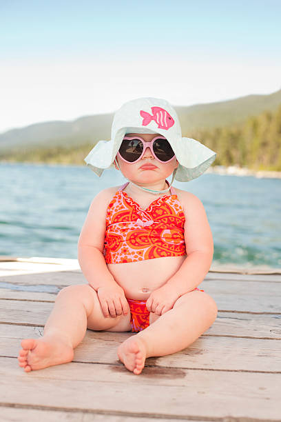 Pouting Beach Baby Stock Photo - Download Image Now - Baby - Human Age,  Humor, Beach - iStock