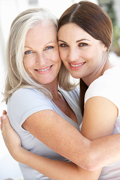 istock Mature Mother And Daughter Hugging 154887218