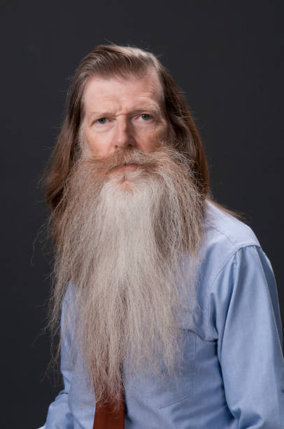 Bearded Man Stock Photo - Download Image Now - Beard, Long Hair, Gray Color - iStock Bearded Man Stock Photo - Download Image Now - Beard, Long Hair, Gray Color - iStock