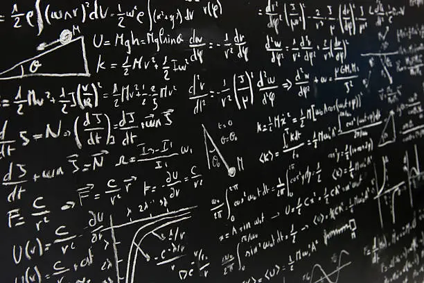 a full school blackboard full of equations