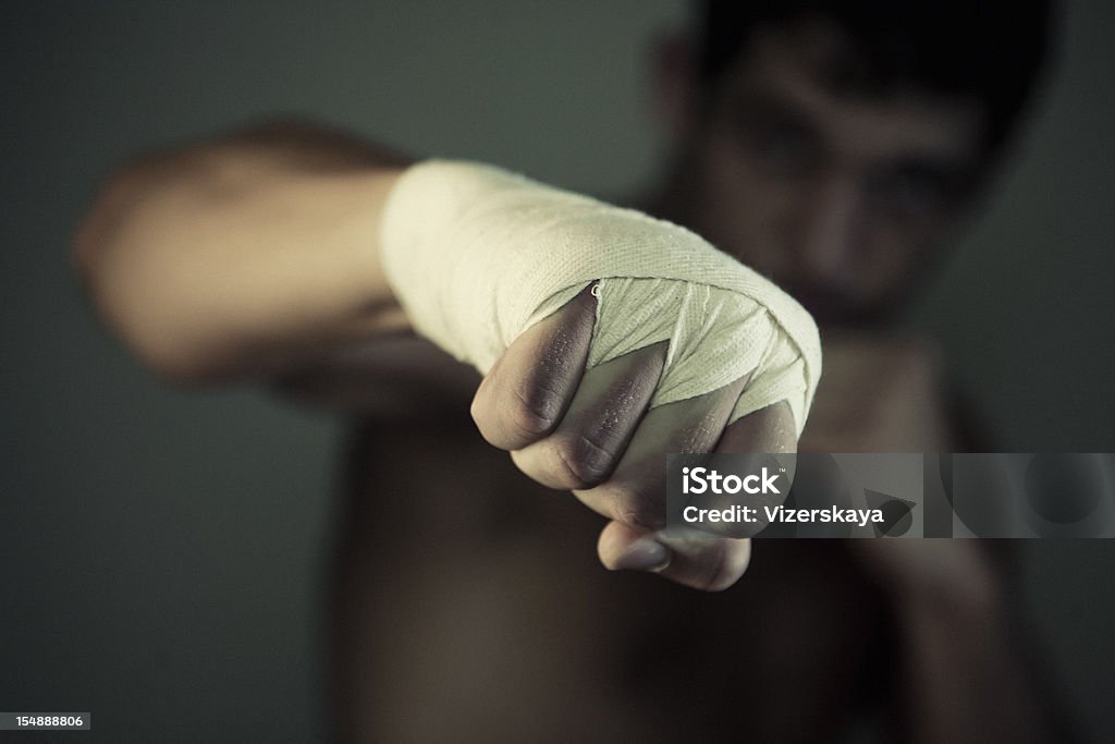 Il pugno di pugilist - Foto stock royalty-free di Kick Boxing