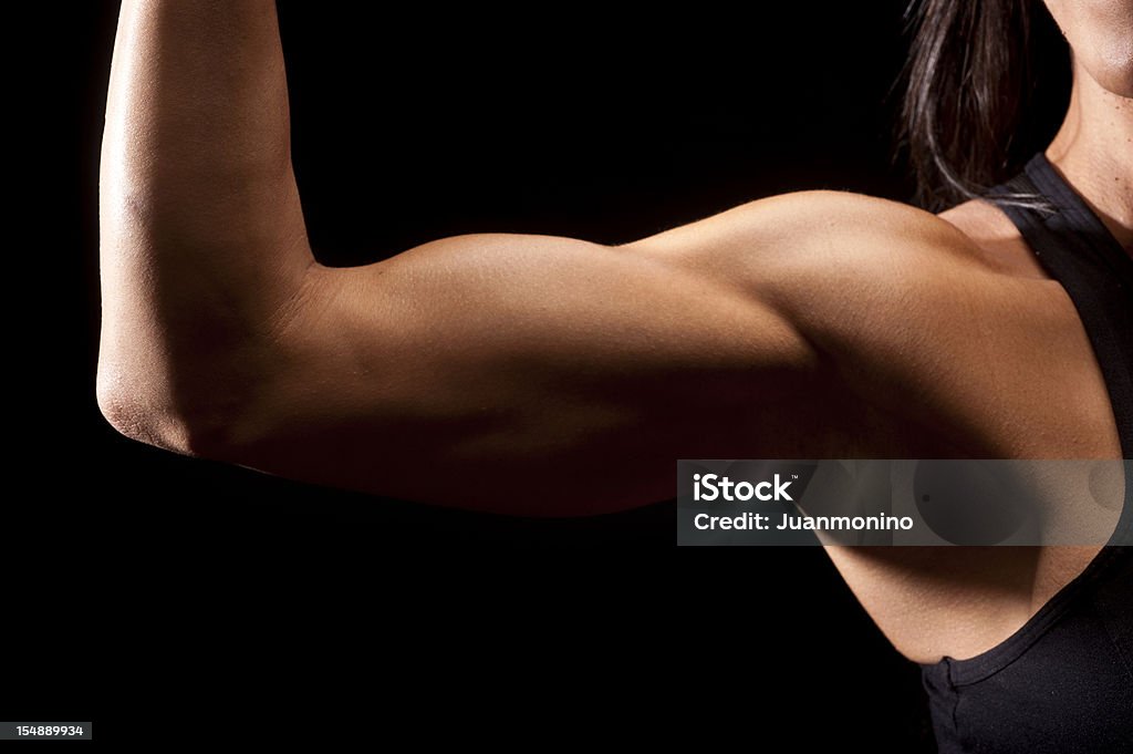 Mulher Músculo bíceps - Foto de stock de Bíceps royalty-free
