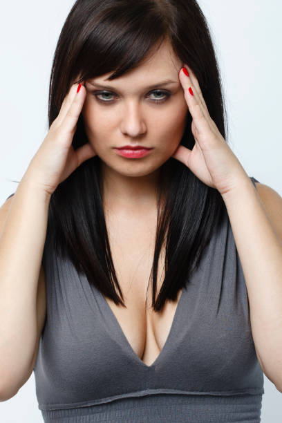 istock Young woman with headache pain 154890800