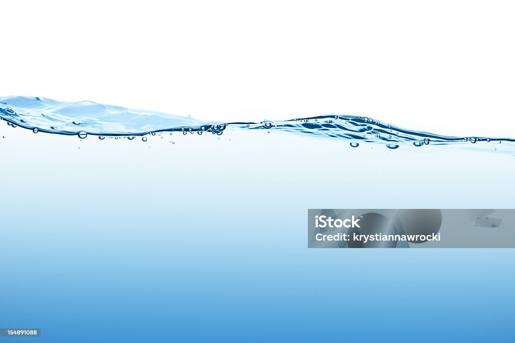 Calm blue water surface with bubbles seen at low angle  Water Stock Photo