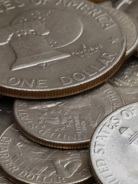 istock Pile of coins from 1976 1548911738
