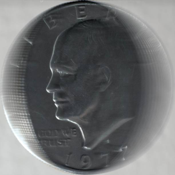 Spinning coin frozen in motion