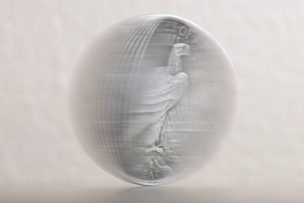 Spinning coin frozen in motion