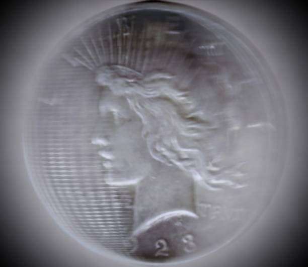 istock Spinning coin frozen in motion 1548912262