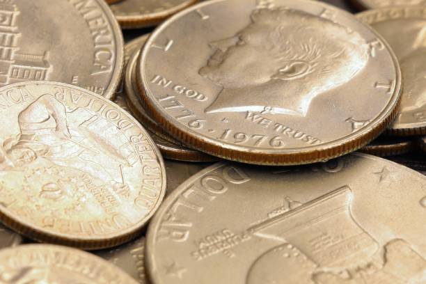 istock Pile of coins from 1976 1548912266