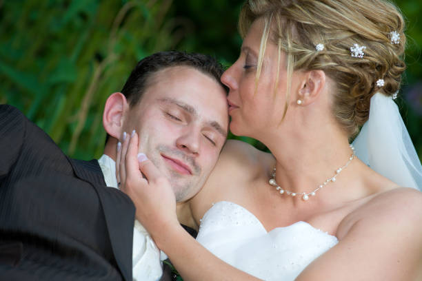 istock Bride kissing groom with love 154891351