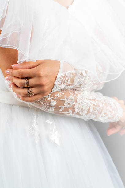istock White dress of the bride. Light fabric texture. 1548928009