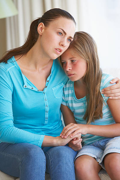 istock Mother Comforting Daughter At Home 154894375