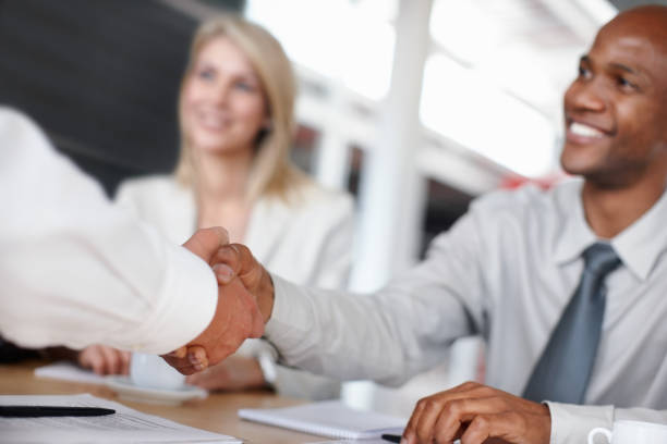 istock Handshake after a successful business meeting 154894860