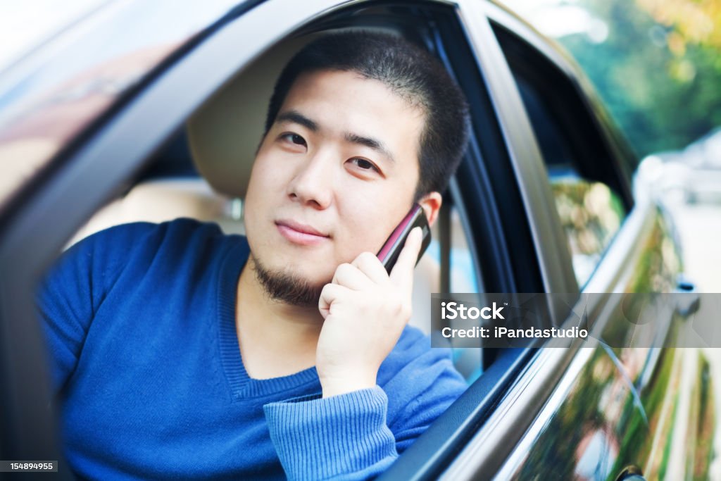 Asiatischen Mann mit dem Auto - Lizenzfrei 2000 Stock-Foto