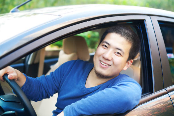 istock Asian man driving car 154894957