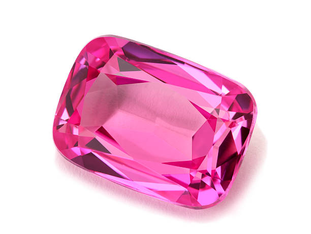 Pink tourmaline gemstone isolated on a white background stock photo