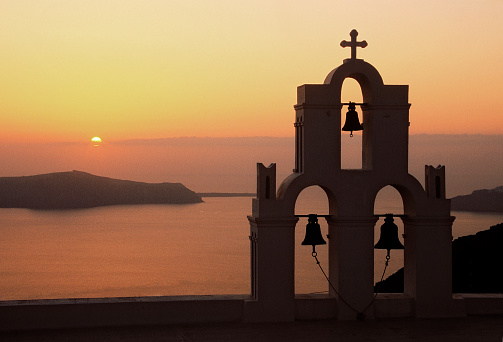 Santorini sunset and church bell, Greece