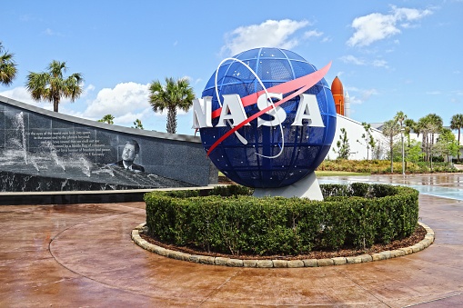 Orlando, United States – October 20, 2017: A logo of a Nasa projected onto a globed in the Kennedy Space Center in Florida