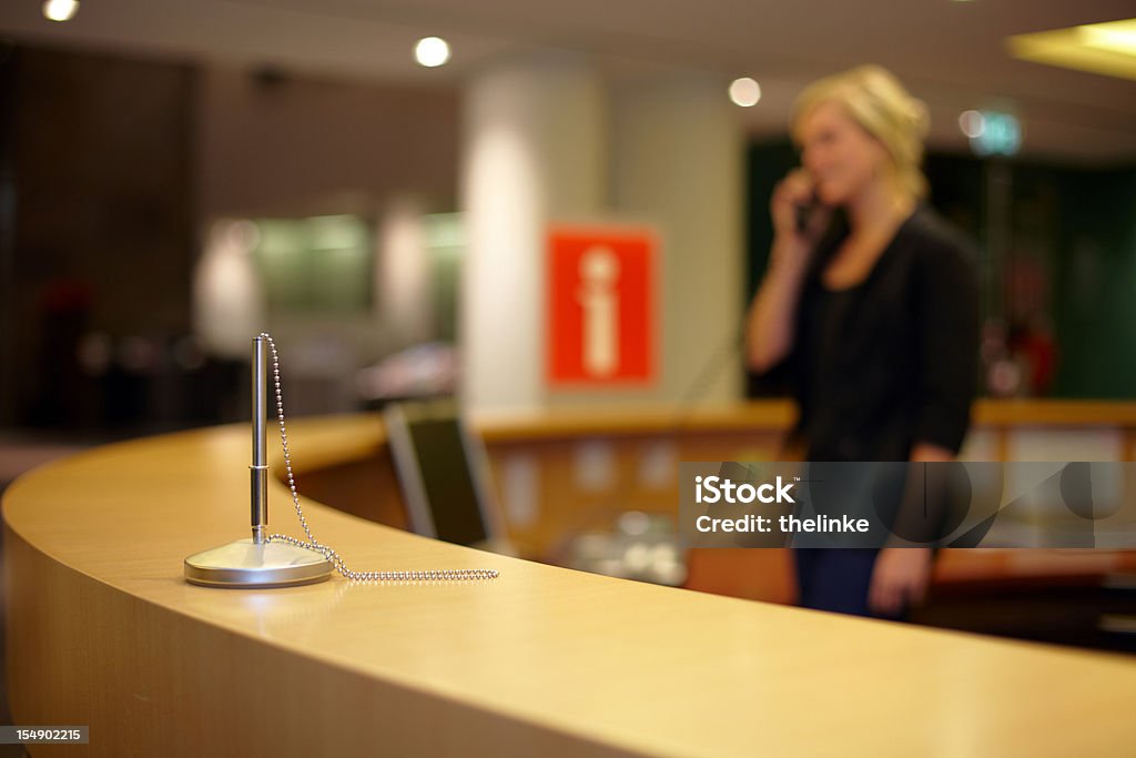 Woman at the information point  Concierge Stock Photo