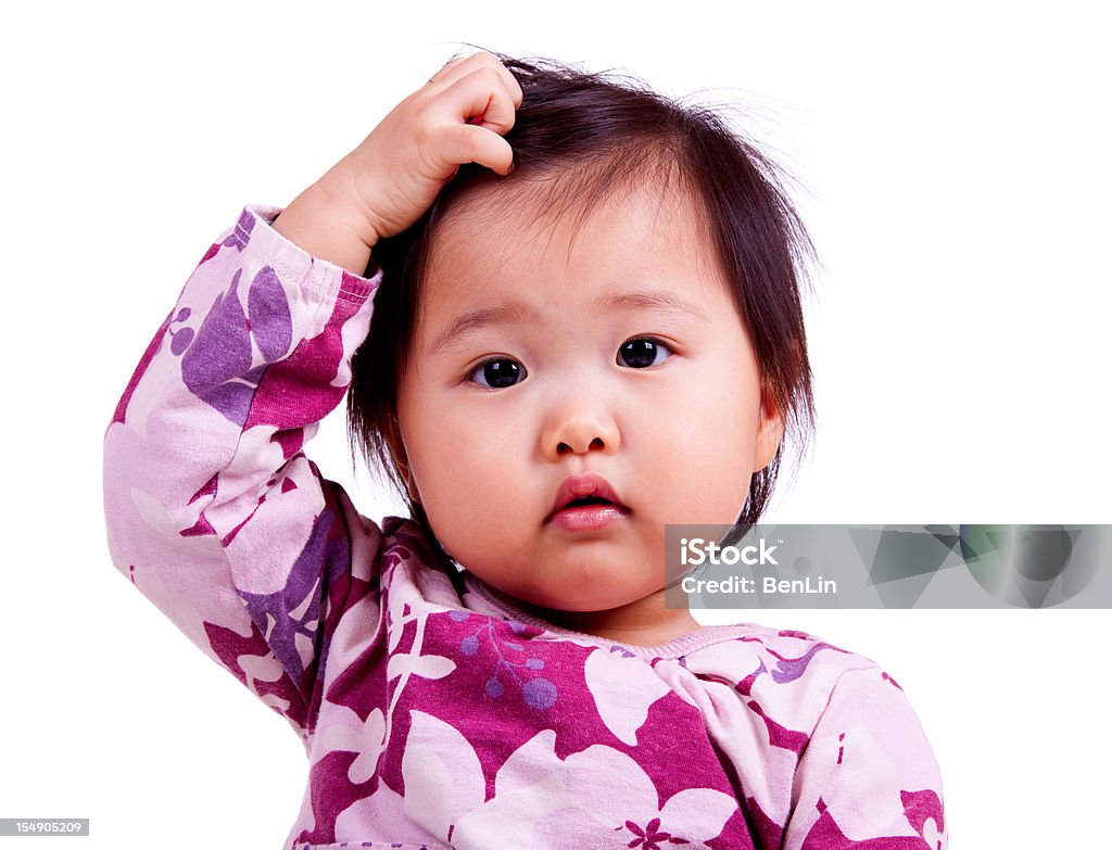Confondu asiatique bébé isolé sur blanc - Photo de Bébé libre de droits