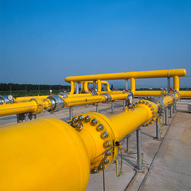 istock Yellow pipes in gas distribution station, blue sky on background 154905794