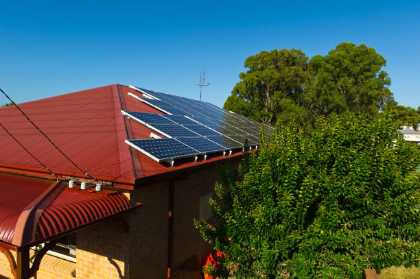 istock Solar Electricity Panels on house roof 154905807