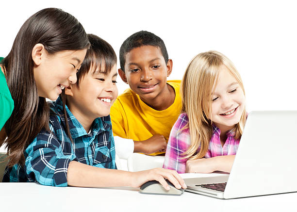 bambini che lavorano su un computer portatile isolato - schoolgirl school children isolated child foto e immagini stock