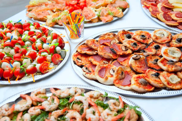 istock buffet with luscious tomatoes, pizza, salmone and shrimps 154906830