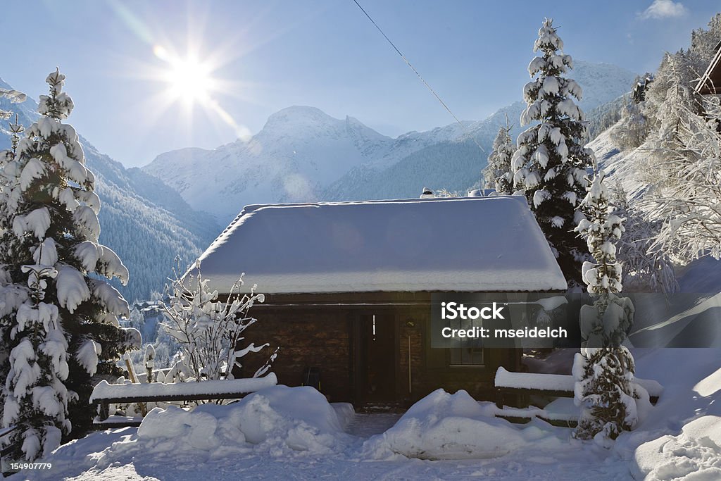 Chalet in the Swiss Alps mountains Swiss Alps Mountains Chalet Stock Photo