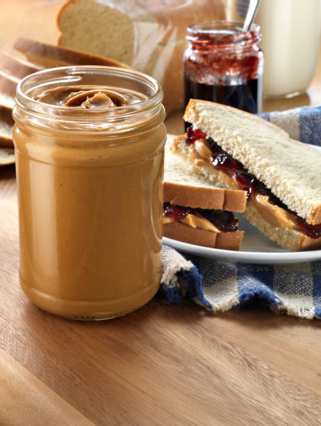 Peanut butter Jar with Sandwich  peanut butter and jelly sandwich stock pictures, royalty-free photos & images