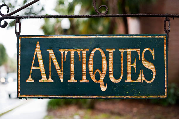 Antiques Sign Old fashion hanging Antiques sign store sign stock pictures, royalty-free photos & images