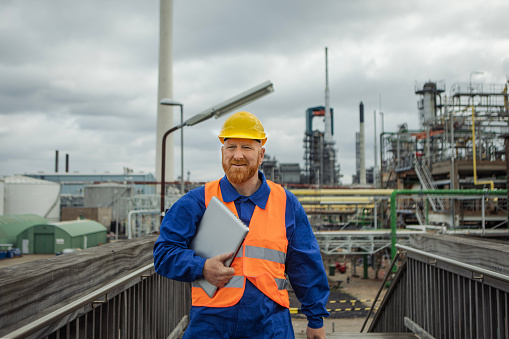 Redhead male engineer on infrastructure site
