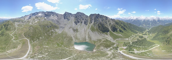 Aerial panoramic view of Klaussee lake - Alto Adige