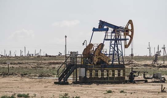 Land drilling rigs for oil production in the Kazakh steppes, industrial structures for oil production