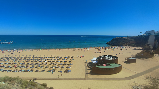 Fisherman`s beach in Albufeira, Portugal in summer of 2023, aerial view